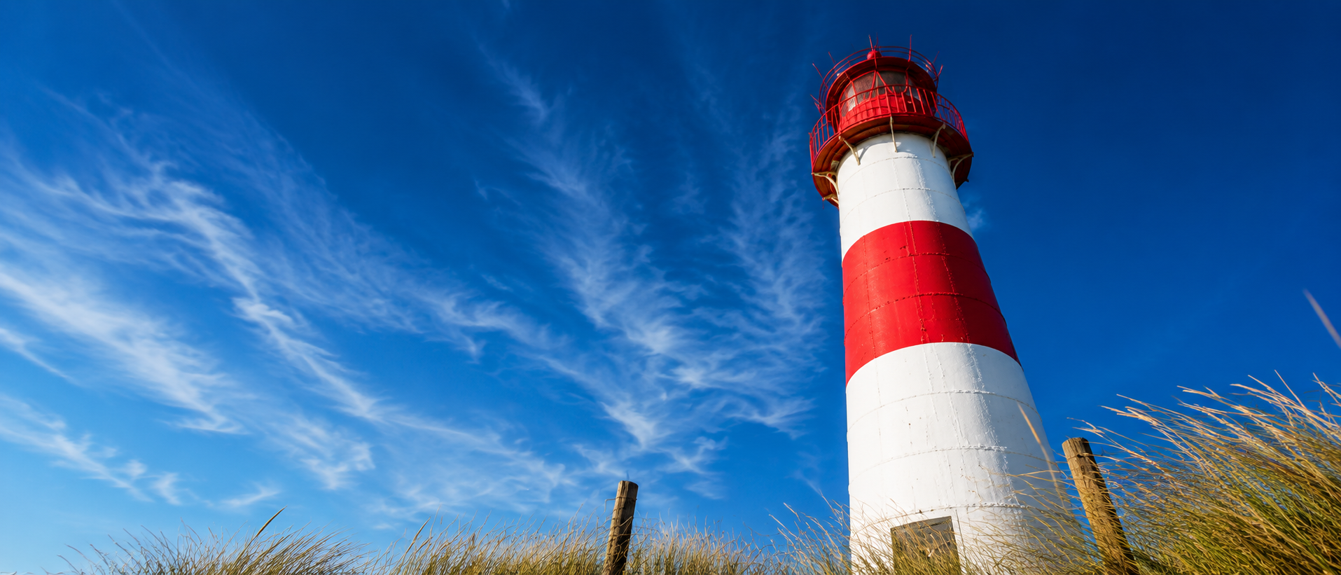 Lighthouse on the coast as a symbol of orientation